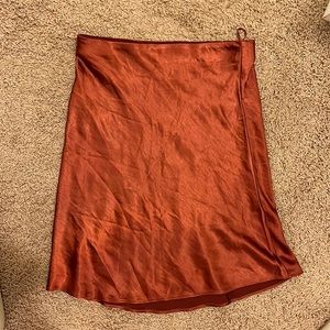 Burnt orange satin mid-thigh skirt, like new, size L